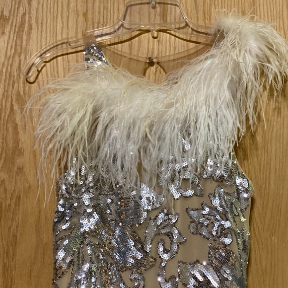 Who doesn’t need some feathers in their life? Beautiful silver cream formal - Picture 2 of 11